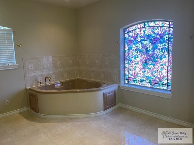 bathroom with tile patterned floors