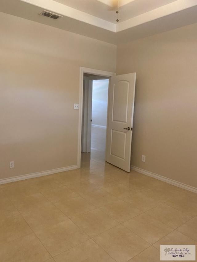 view of tiled spare room