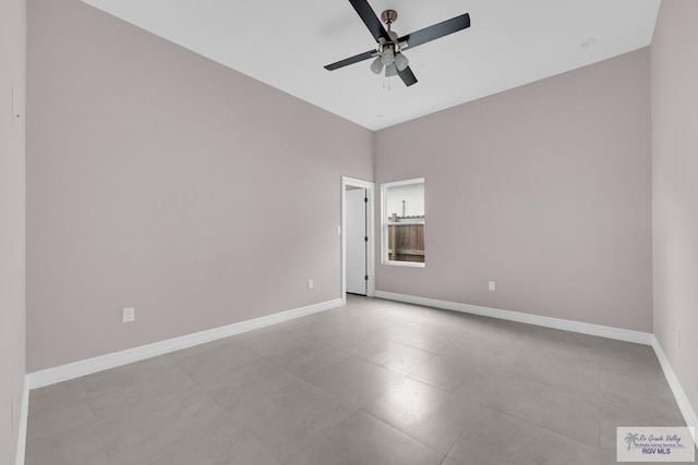 spare room with ceiling fan