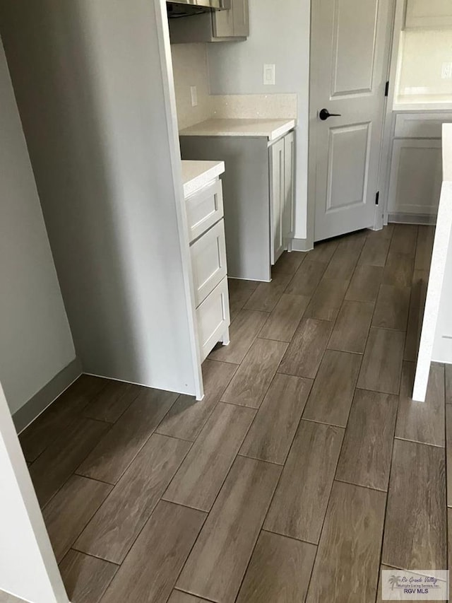 2914 Brushy Ct, Harlingen, TX 78552 - laundry area with wood tiled floors
