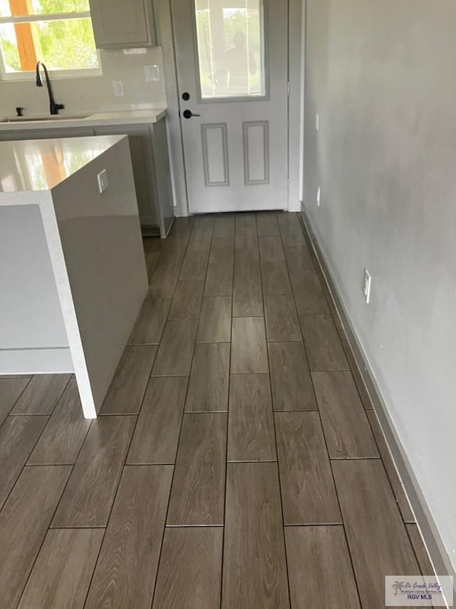 2914 Brushy Ct, Harlingen, TX 78552 - kitchen featuring wood finish floors and light countertops