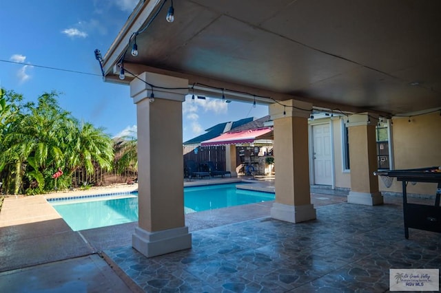 view of pool with a patio