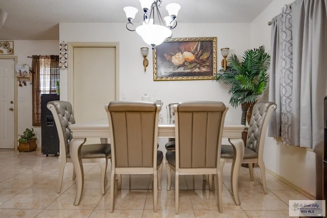 dining room with a chandelier