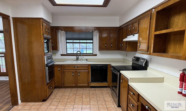 kitchen featuring sink and black appliances