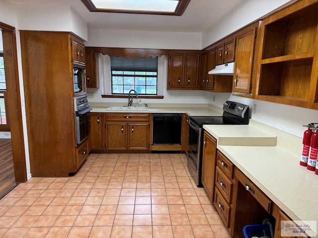 kitchen featuring sink and black appliances