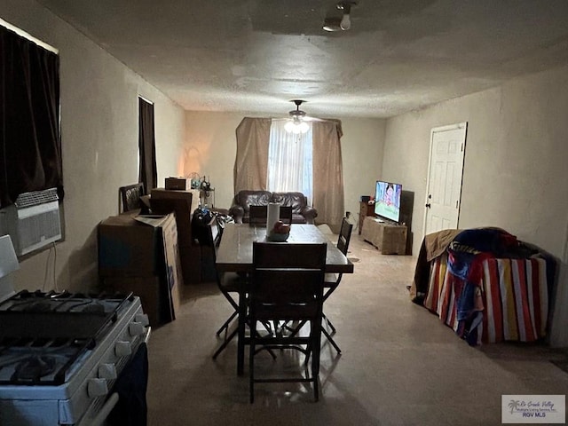 carpeted dining space with ceiling fan and cooling unit