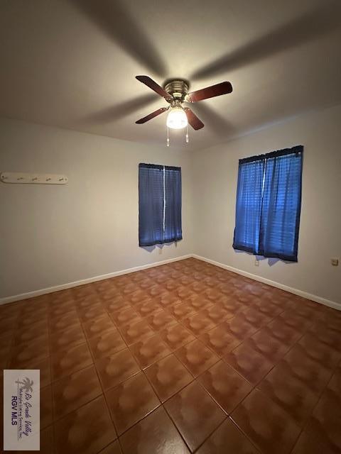 2226 E Austin Ave, Harlingen, TX 78550 - empty room with ceiling fan and baseboards