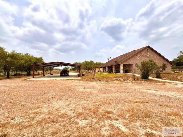 view of yard featuring a carport