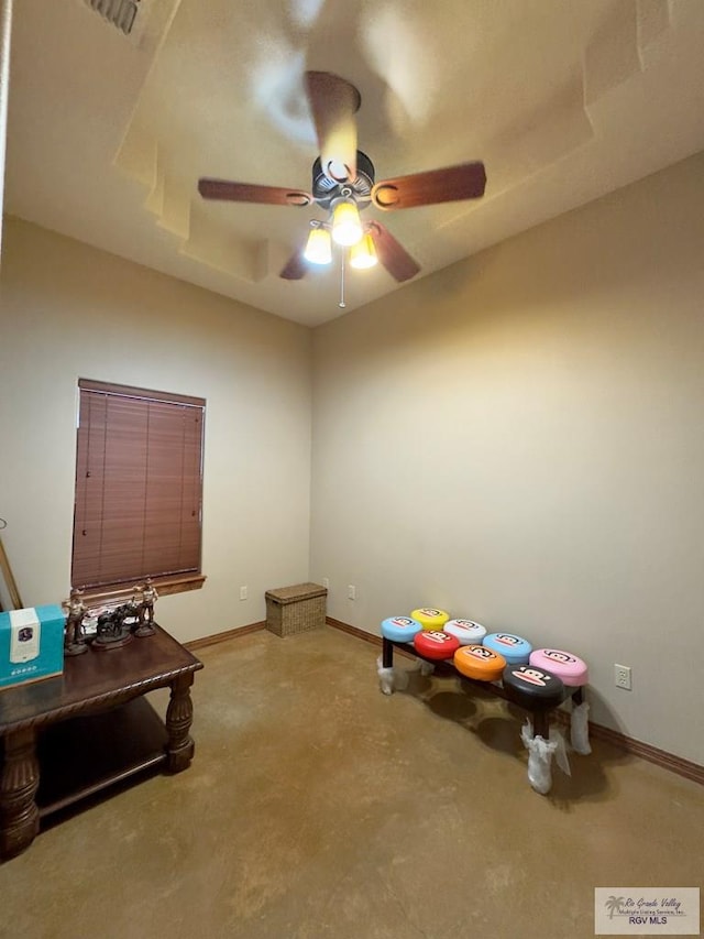 misc room with ceiling fan and light carpet