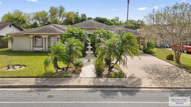 view of front facade with a front yard