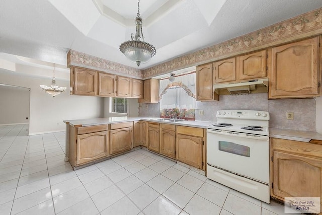 kitchen with white range with electric cooktop, pendant lighting, light tile patterned floors, and a tray ceiling