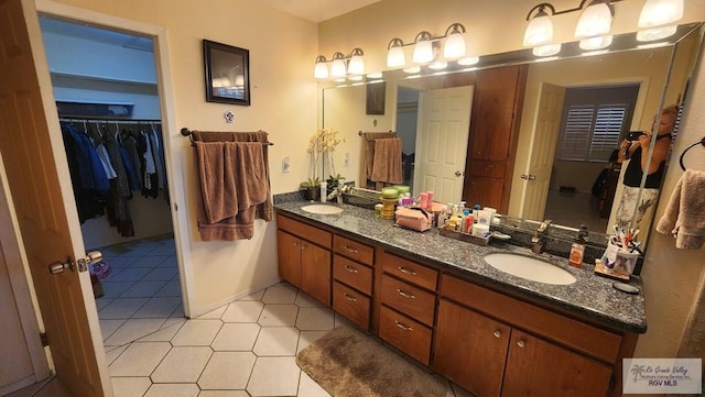 bathroom featuring tile patterned floors and vanity