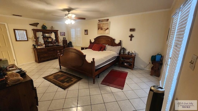 bedroom featuring ceiling fan, ornamental molding, and light tile patterned flooring