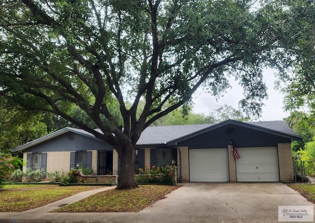 ranch-style home with a garage