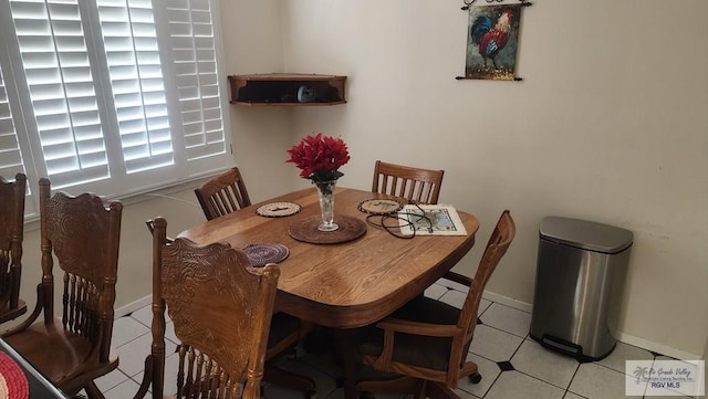 dining room with light tile patterned floors