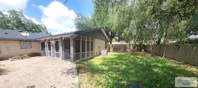 exterior space with a yard and a patio