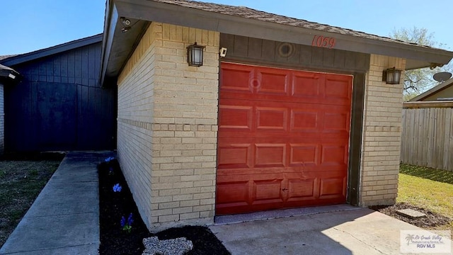 detached garage with fence