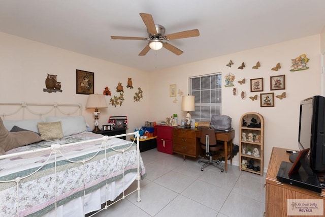 117 W 6th St, San Juan, TX 78589 - bedroom with a desk, light tile patterned flooring, and ceiling fan