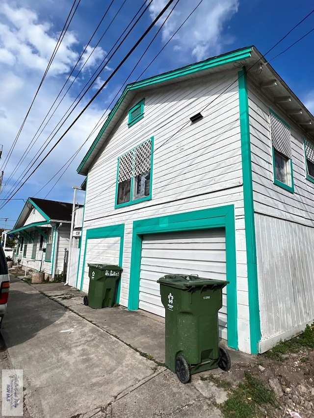 view of home's exterior featuring a garage