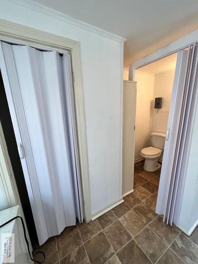 bathroom featuring toilet