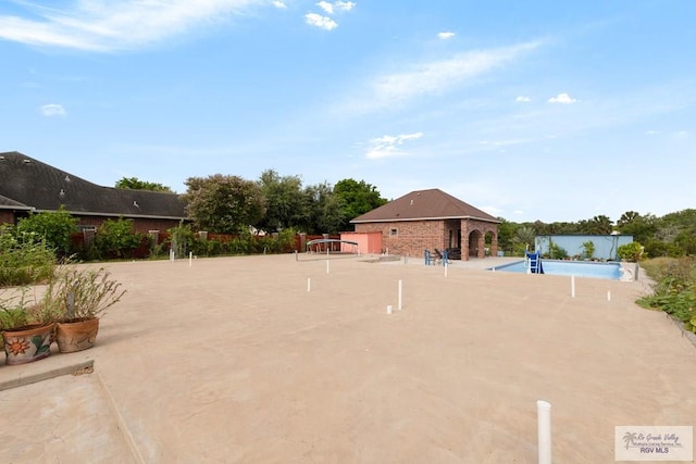 view of community featuring a pool