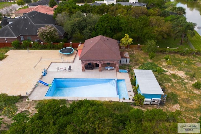 birds eye view of property featuring a water view