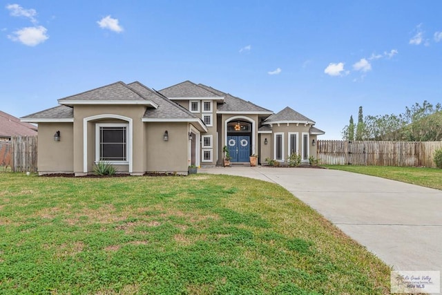 view of front facade with a front lawn