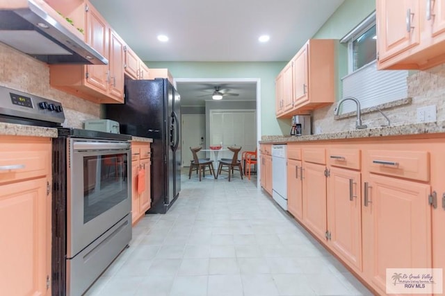 kitchen with light brown cabinets, stainless steel range with electric cooktop, exhaust hood, white dishwasher, and ceiling fan