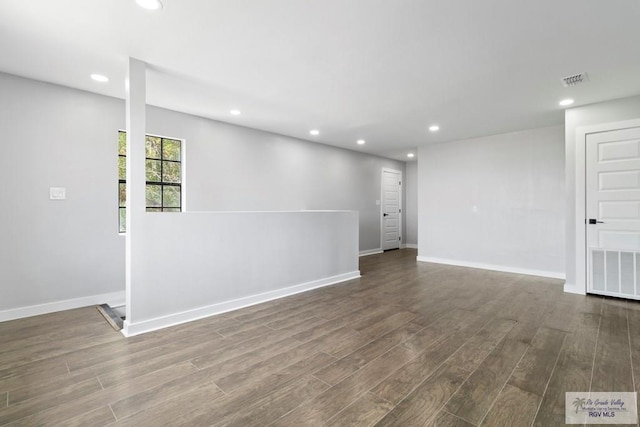 1214 W Monroe Ave, Harlingen, TX 78550 - empty room featuring recessed lighting, wood finished floors, and baseboards
