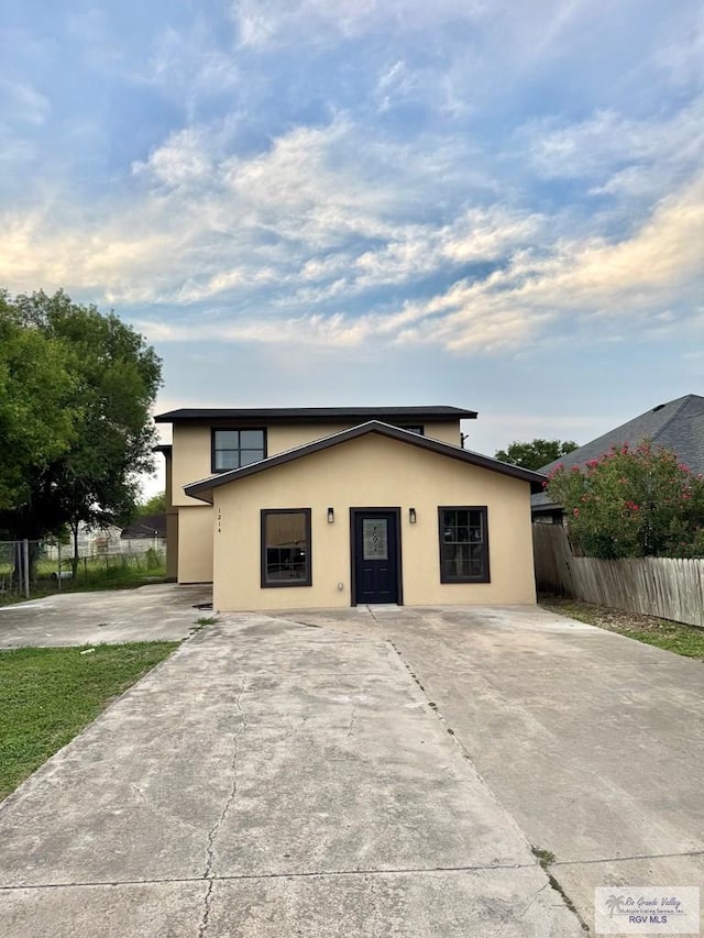 1214 W Monroe Ave, Harlingen, TX 78550 - view of front of home with stucco siding