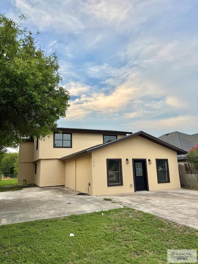 1214 W Monroe Ave, Harlingen, TX 78550 - view of front facade with stucco siding