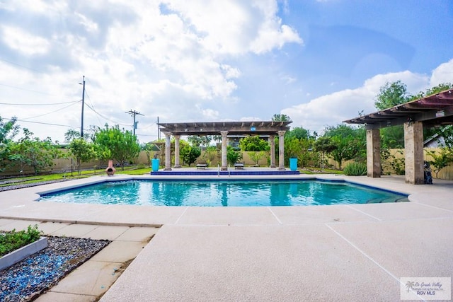 view of pool with a pergola