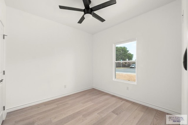 empty room with light wood-style floors, ceiling fan, and baseboards