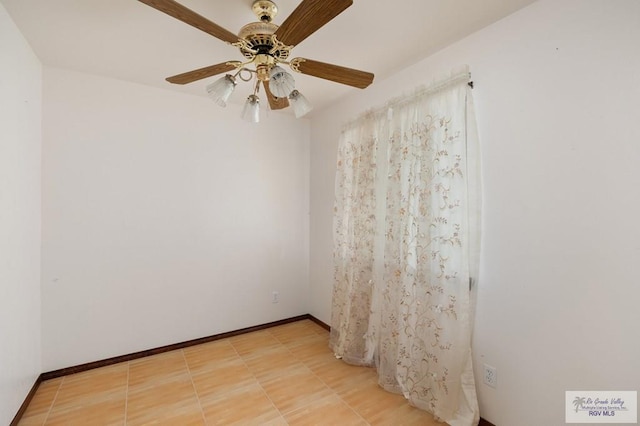 spare room featuring ceiling fan