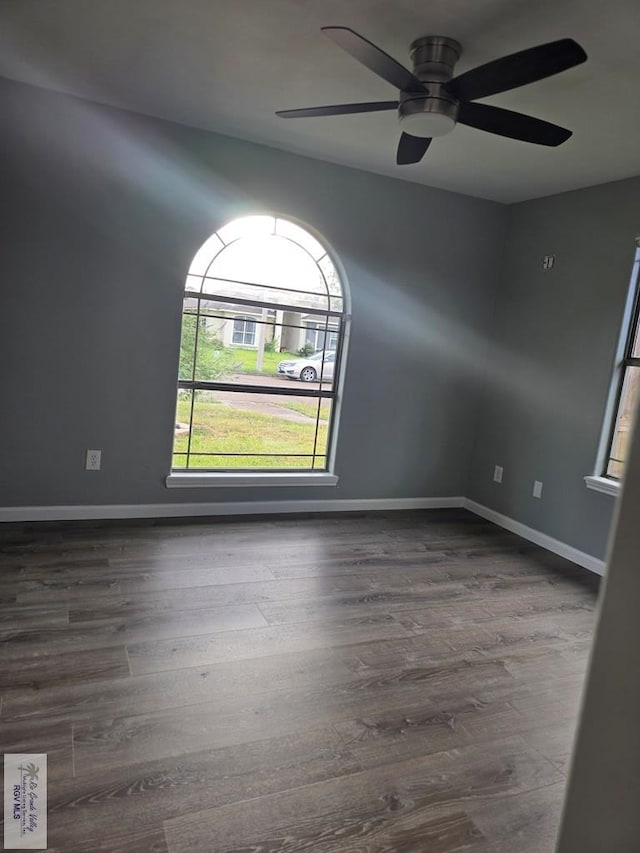 4116 Yoli Ln, Brownsville, TX 78521 - unfurnished room featuring dark wood-type flooring and a ceiling fan