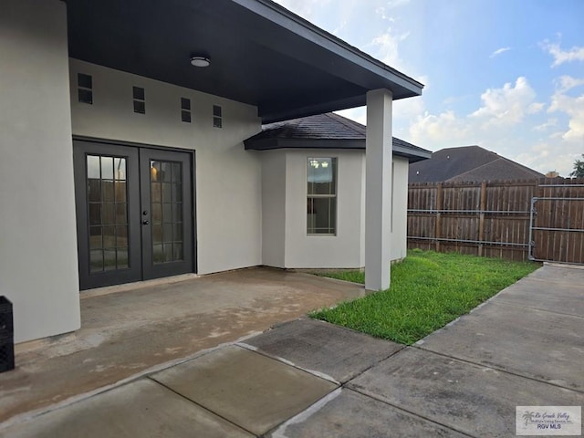 4116 Yoli Ln, Brownsville, TX 78521 - view of patio featuring french doors