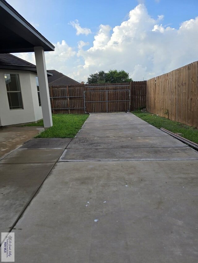 4116 Yoli Ln, Brownsville, TX 78521 - fenced backyard featuring a patio