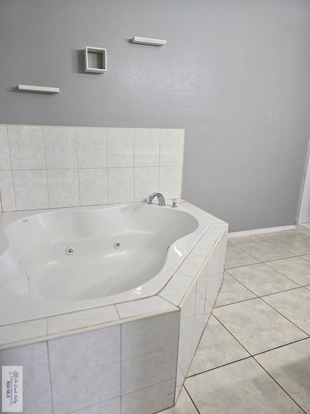 4116 Yoli Ln, Brownsville, TX 78521 - bathroom with a jetted tub and tile patterned floors
