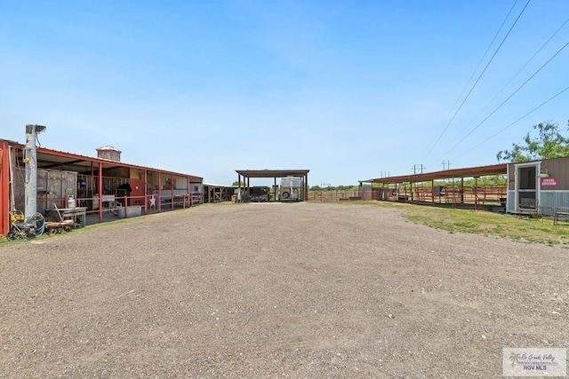 30202 Ratliff Rd, San Benito, TX 78586 - view of dirt / gravel road with an exterior structure
