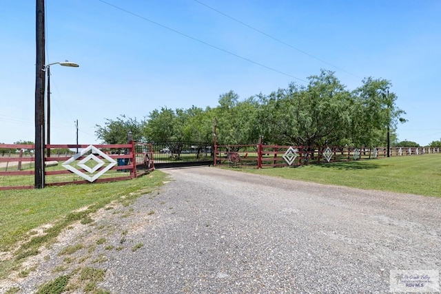 30202 Ratliff Rd, San Benito, TX 78586 - view of street with a gate