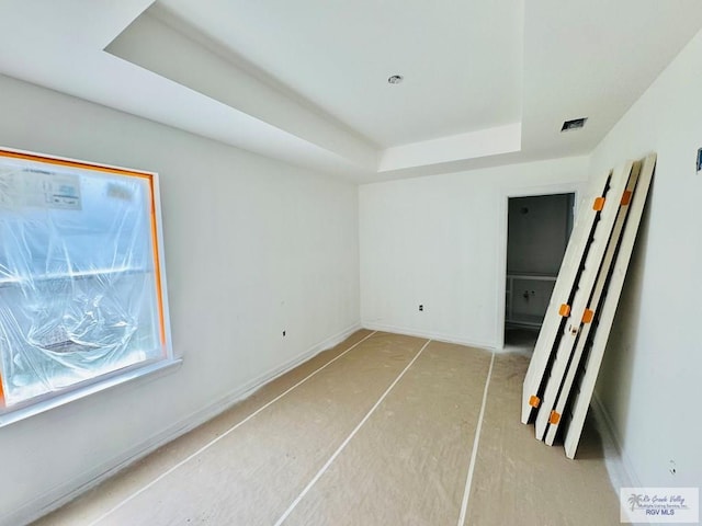 107 Willacy Ave, Brownsville, TX 78521 - empty room with a raised ceiling and baseboards