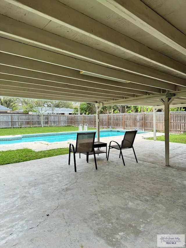 view of pool featuring a patio area