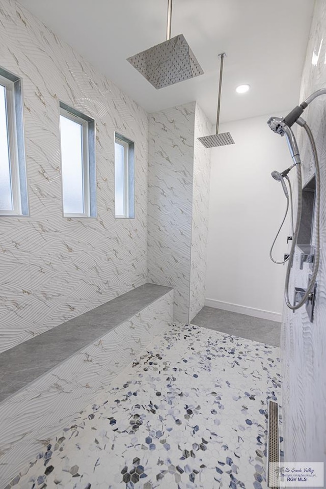 bathroom featuring tiled shower