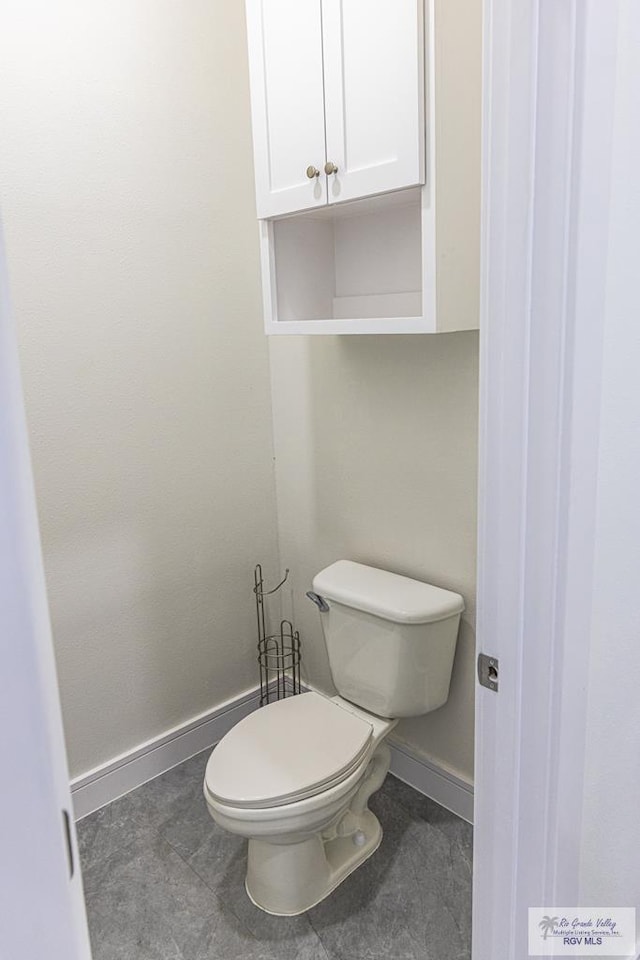 bathroom featuring toilet