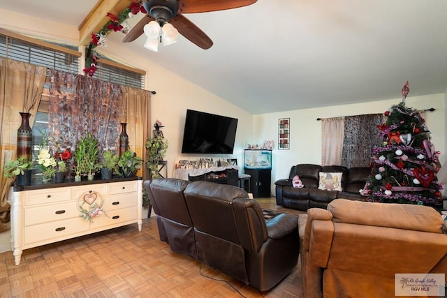 living room with light parquet flooring, vaulted ceiling, and ceiling fan