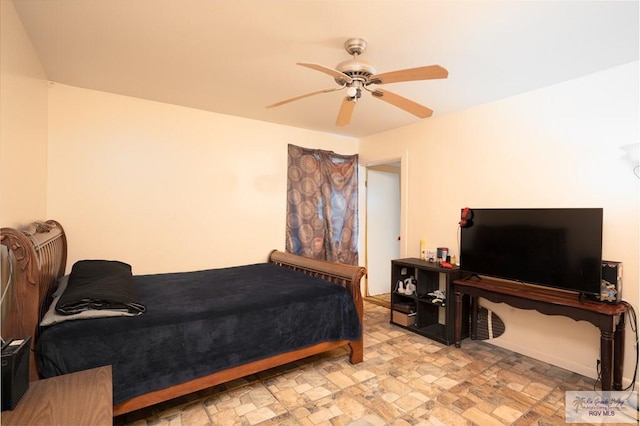 bedroom featuring ceiling fan