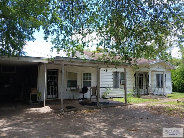 609 E Filmore Ave, Harlingen, TX 78550 - ranch-style house with covered porch