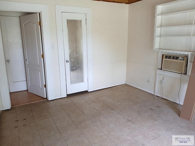 609 E Filmore Ave, Harlingen, TX 78550 - empty room with tile patterned flooring