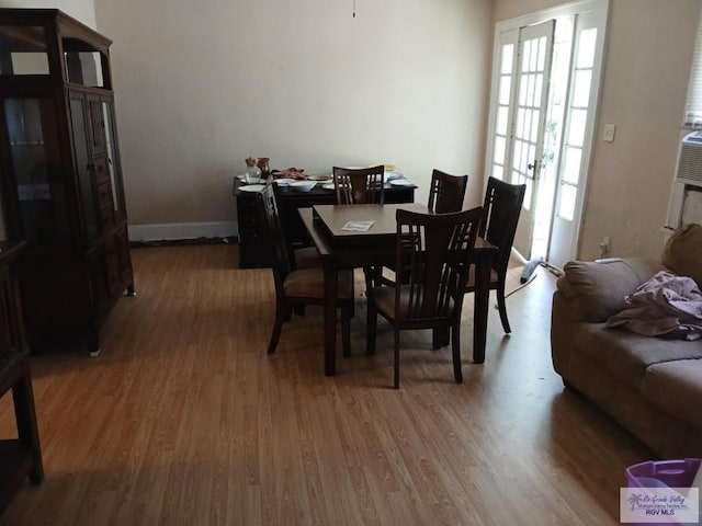 609 E Filmore Ave, Harlingen, TX 78550 - dining space with wood finished floors and plenty of natural light