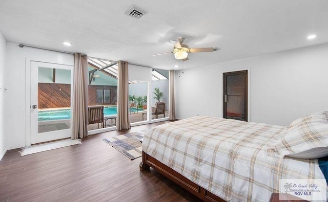 bedroom with dark wood-type flooring, ceiling fan, floor to ceiling windows, and access to exterior